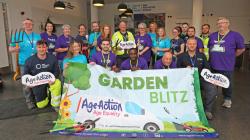 Volunteers and staff from Age Action posing with Garden Blitz Banner
